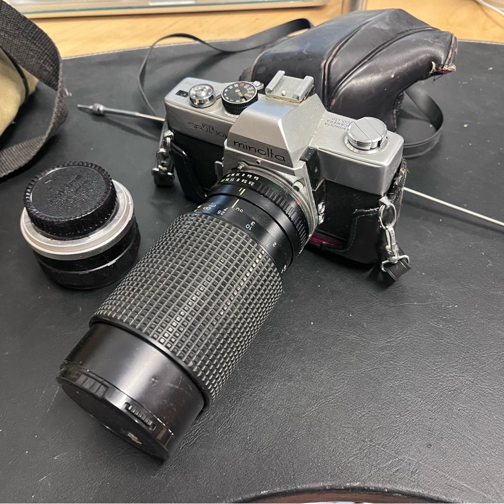 Minolta SR T 101 35mm Film Camera w/case and zoom lense.